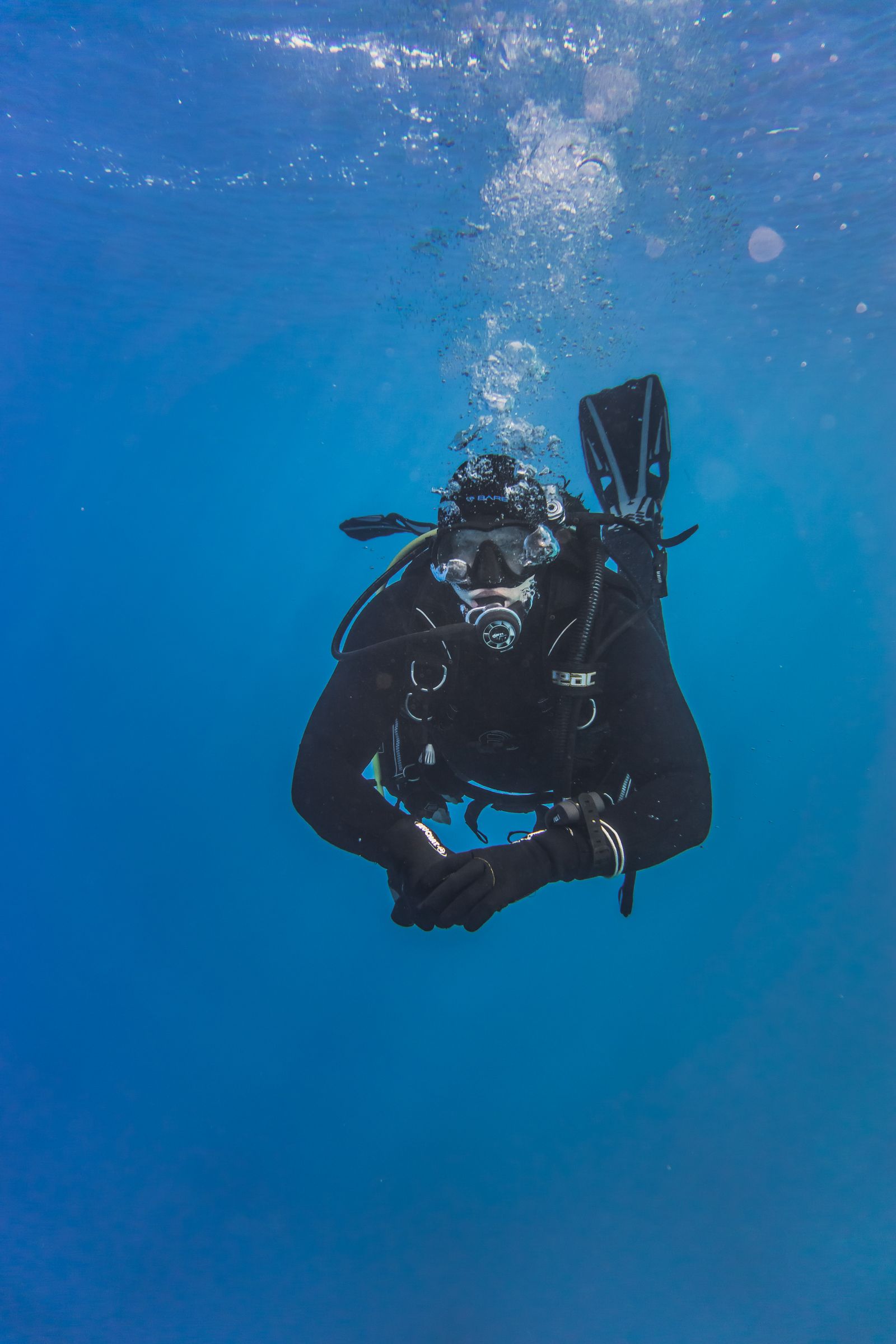Scuba diver exploring clear blue water